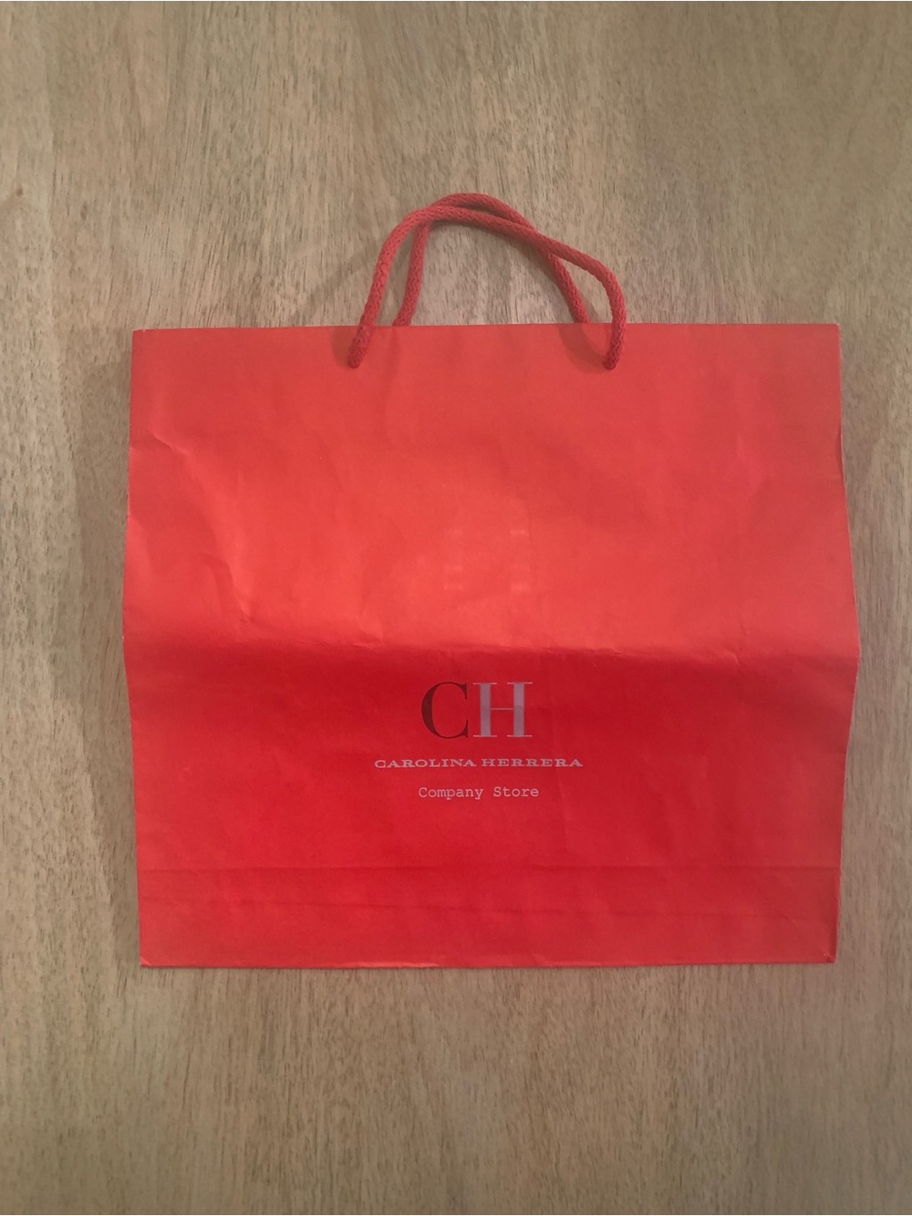 Carolina Herrera medium reusable silver and red gift bag